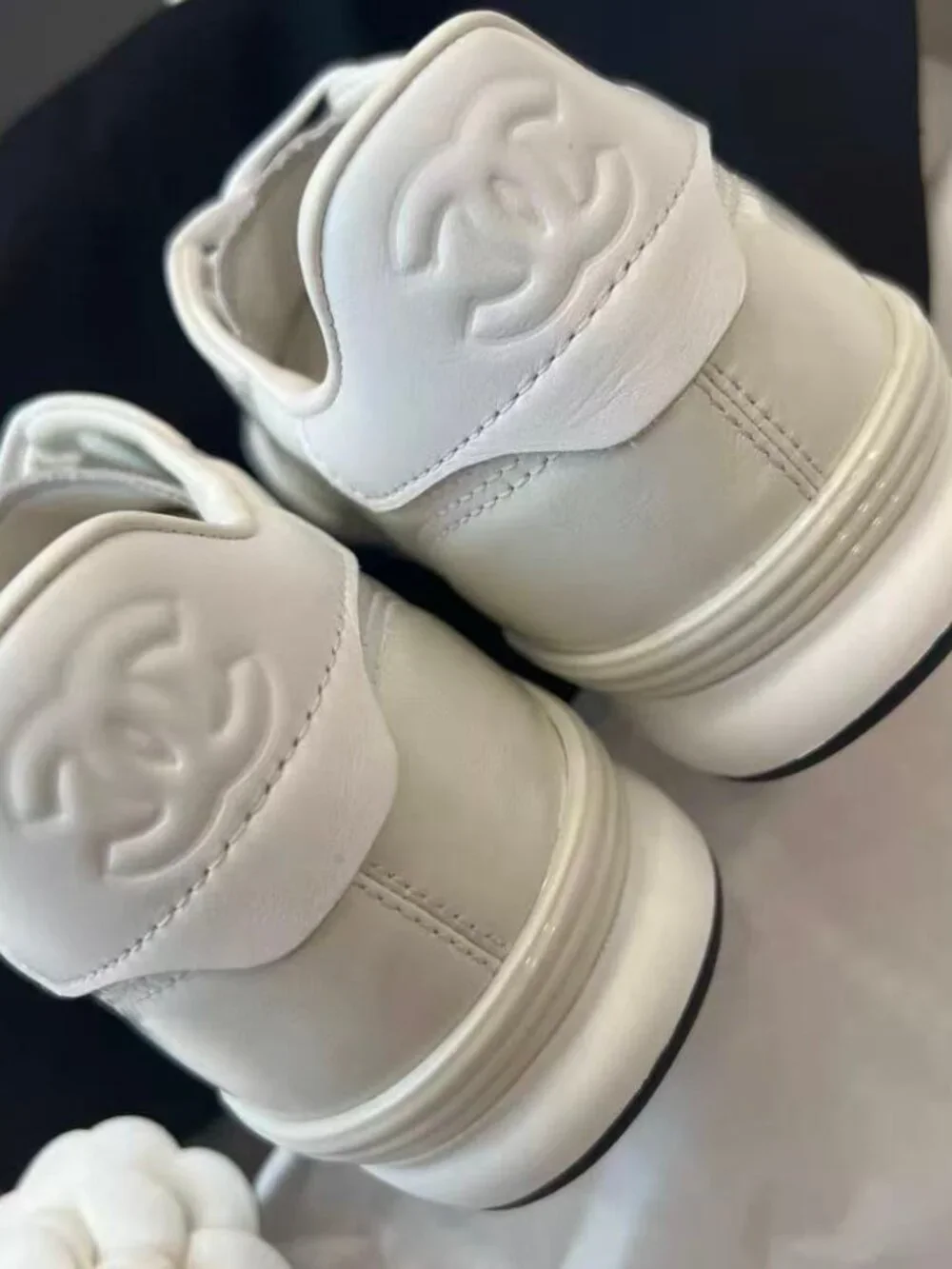Chanel White Quilted CC Logo Leather & Suede Low‑Top Sneakers